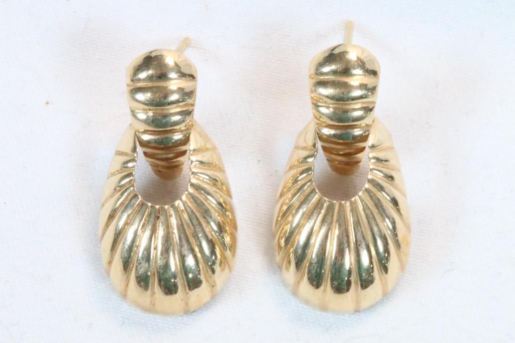 14kt gold drop shell design pierced earrings: Not hallmarked but tests 14kt. no post backs 1" x 0.5" weighs 5 grams.