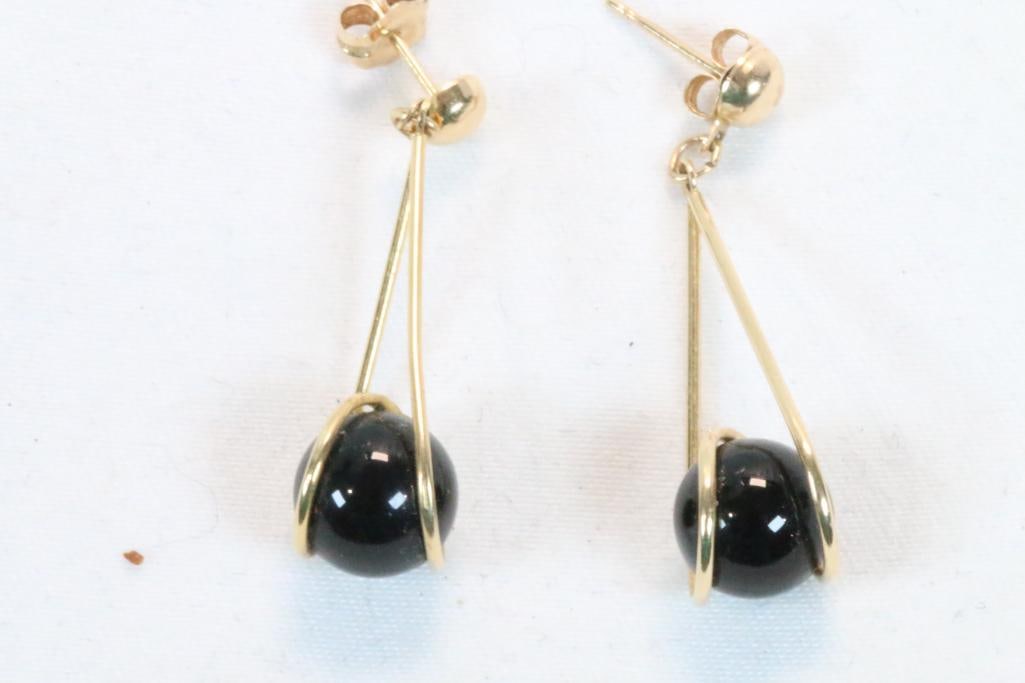 14kt gold long dangle swirl cage drop pierced earrings onyx ball 2.3 grams: Measures: 1.25" drop, 8mm round black onyx ball.