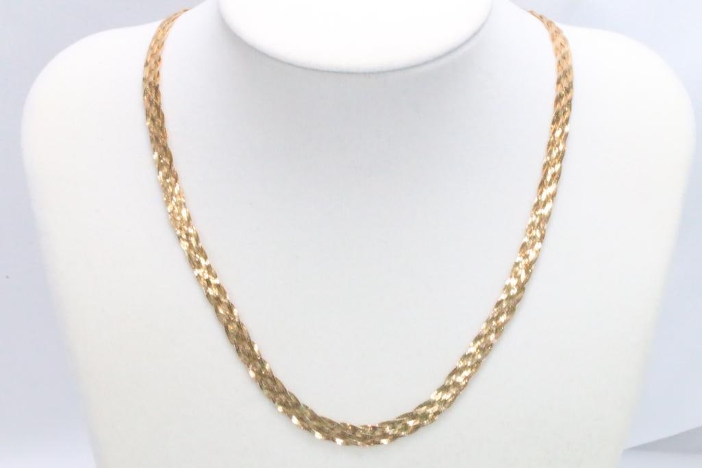 14KT GOLD BRAIDED NECKLACE 16.5" 9.8 GRAMS: Multiple strand braided necklace with lobster clasp measures 1/4" wide.
