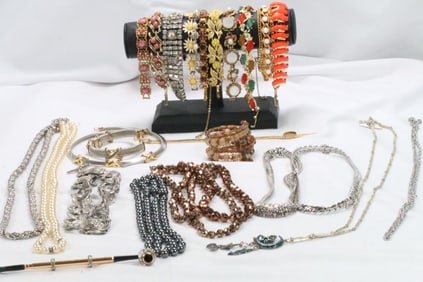 Lot of 22 Vintage necklaces, bracelets and ladies pipe .