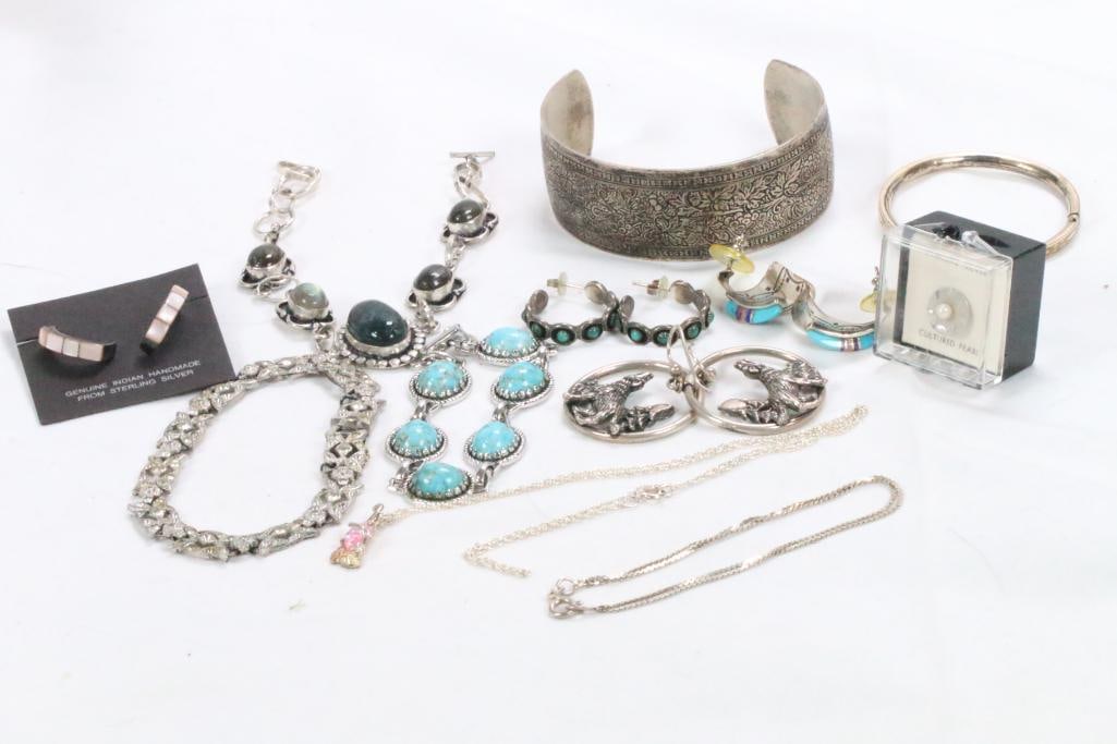 Sterling Silver Lot of Jewelry: Includes 6 bracelets, 3 pair earrings, 1 tac pin and 1 necklace. Weight with stones is 118 grams