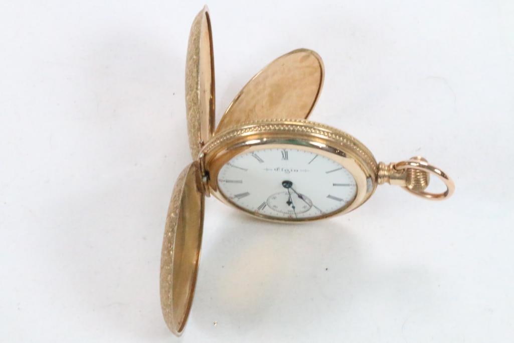Antique Elgin Gold filled Pocket watch: Missing Crystal. PURITAN HALLMARK. Little over 1/2" across. Beautiful all over etched design.