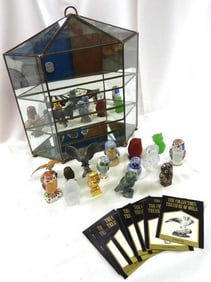 Collection of 15 owls stone, quartz, ceramic with glass display case