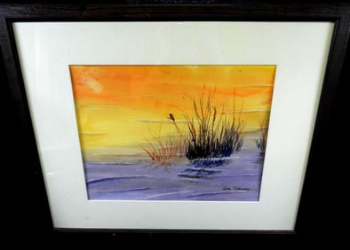 Framed watercolor painting of marsh at sunset