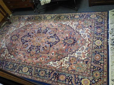 Karastan Heriz pattern 5.9 x 9 area wool rug