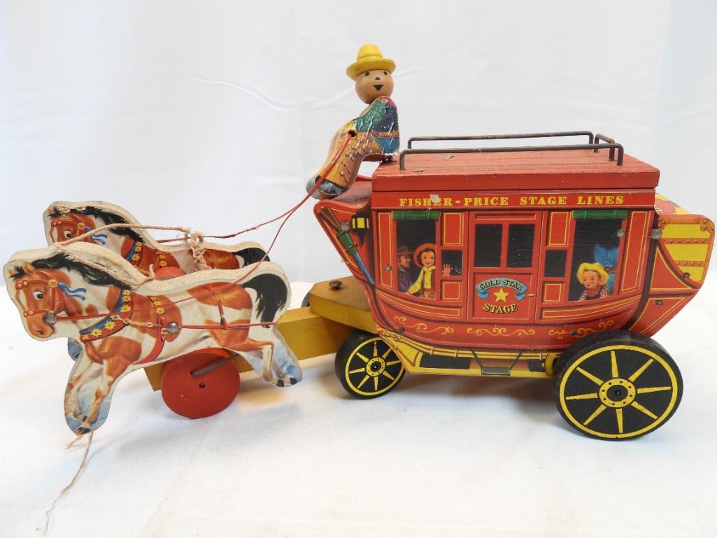 Vintage Wood painted Fisher-Price Gold-Star Stagecoach pull toy: Vintage Fisher-Price Gold-Star Stagecoach pull toy, approx. 9" tall with driver on top and 15" long