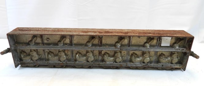 antique metal Chocolate mold with bunny rabbits pushing carriages Easter