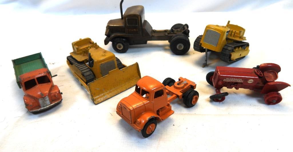 LOT OF 6 Vintage diecast metal dinky, tootsie, matchbox and Endlic brass: LOT OF 6 Vintage metal vehicles: tractors, log hauler truck and bulldozers, ranging in 2" to 5" in length
