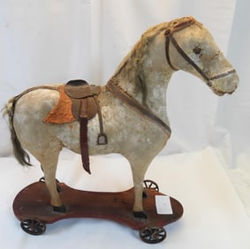 Antique wood flocking painted pull toy horse metal wheels