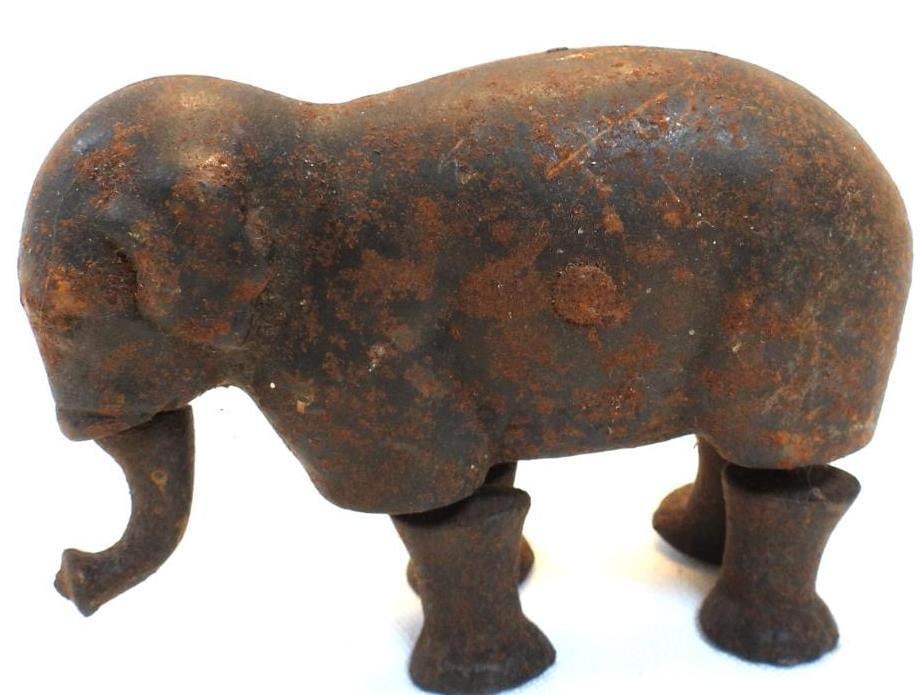 Antique Mechanical Cast-Iron Elephant with moveable legs: Antique Mechanical Cast-Iron Elephant with moveable legs, approx. 3.5" long x 2.25" tall