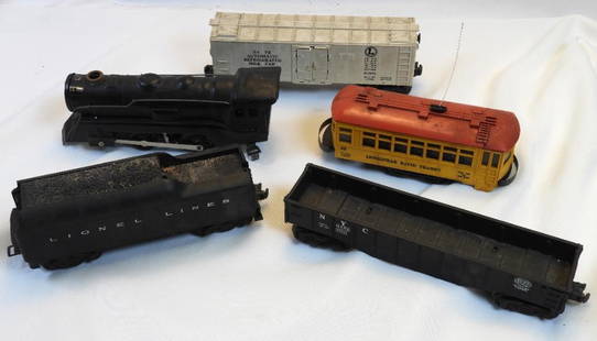 Vintage LOT OF 5 LIONEL train cars: LOT OF 5 LIONEL train cars, ranging in length from approx. 7" to 9.75" long