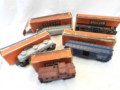 Vintage LOT OF 5 LIONEL train cars in boxes: LOT OF 5 LIONEL train cars in box, including 6414 auto-loader, 6357 caboose, 3562 barrel car, 6415 Sunoco oil car, and 6468 B&O automobile car, boxes have wear and tear due to age