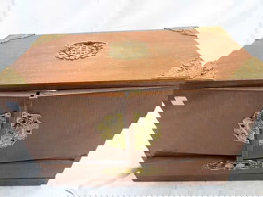 Asian-style jewelry box full of jewelry and treasures