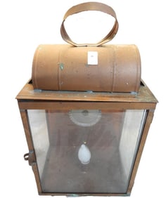 Vintage copper lantern with electric light and single bulb