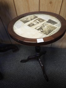 Antique Photo Inlay Accent Table shown with vintage hankies and photographs