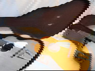 Vintage Champ Acoustic Guitar, likely a parlor-size model, in case