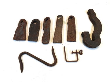 LOT OF 8 cast iron items including railway spikes, hooks, etc.