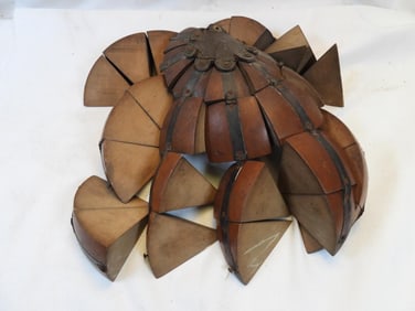 Antique wooden helmet