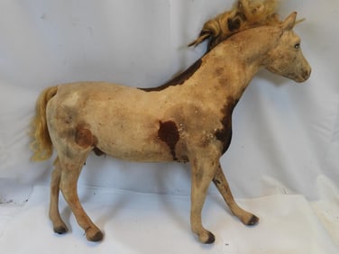 Antique flocked wood old horse toy on wheels