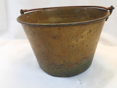 Antique brass bucket, likely from the 19th century