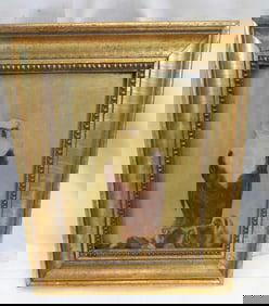 Antique framed painting of a bald eagle perched on a rock