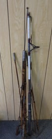 LOT OF 8 collection of antique fishing rods poles, cane rods and Sea Striker surfer rod