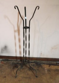 Cast metal umbrella stand