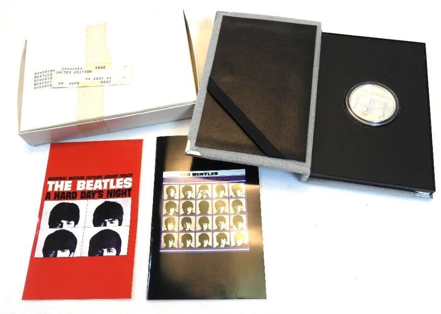 1991 BEATLES A Hard Days Night 1 oz Silver Round coin in case: 1991 BEATLES A Hard Days Night 1 oz Silver Round coin in case, coin is approx. 1.5" in diameter and case is approx. 4"x6"