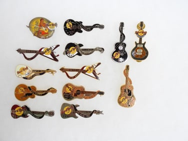 LOT OF 13 Hard Rock Café pins including Buddy Holly, Roy Orbison, etc.