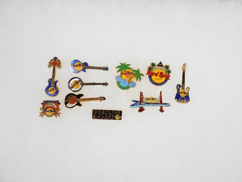 LOT OF 10 Hard Rock Café pins including St Louis, Aspen and Baltimore: LOT OF 10 Hard Rock Café pins including St Louis, Aspen, Baltimore, Myrtle Beach Opening Staff pin (see photos for designs