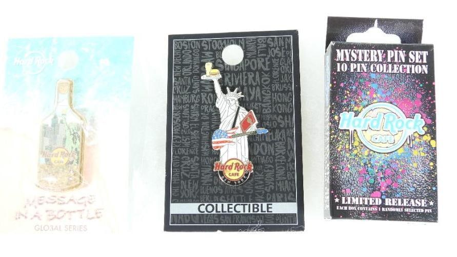 LOT OF 3 Hard Rock Café Pins including Limited Release pin in box: LOT OF 3 Hard Rock Café Pins including Limited Release pin in box, Message in bottle in packaging, and Statue of Liberty (see photos for designs)