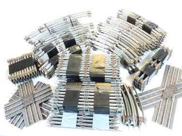 Large LOT of LIONEL train tracks, straight, curved, and intersecting