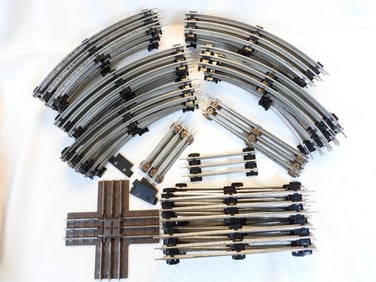 Large lot of LIONEL train track (curved, intersections, etc.)