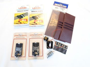 LOT full of LIONEL train illuminated lock-ons, track clips, etc.