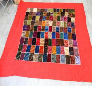 Multi-colored rectangle design red reversible quilt, 65" x 80"