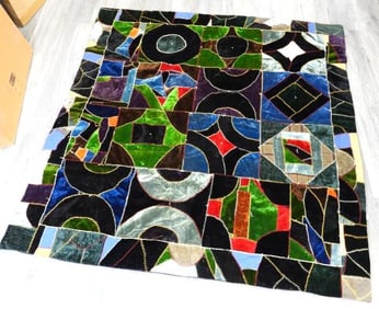 Multi-colored geometric print quilt, 65" x 69"