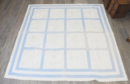 Vintage light blue/white quilt with different images, 85" x 86"