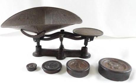 Antique 14" cast iron scale with four weights