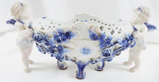 Blue and white floral bowl with cherubs