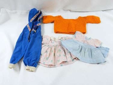 Vintage lot of doll clothes including dresses, sweater & full outfit