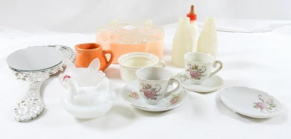 Vintage lot of tea cups, chicken on eggs, baby bottles and doll perfume bottles in case