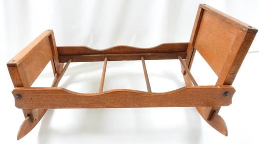 Vintage wooden doll cradle
