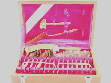 LOT OF 19 plated flatware and servers in display case