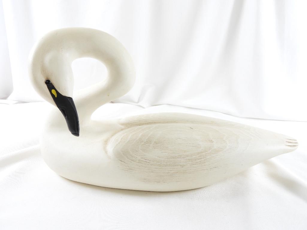 Hand-carved and painted wooden white swan decoy, marked on bottom