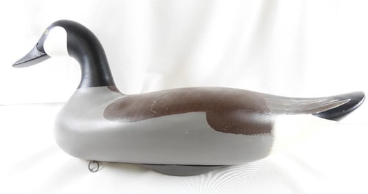 Hand-carved and painted wooden Canadian duck decoy, signed by Dave Walker, 2006