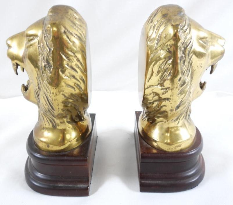 Pair of vintage brass lion head bookends: Pair of vintage brass lion head bookends, 8"T x 4.5"L x 3.5"W
