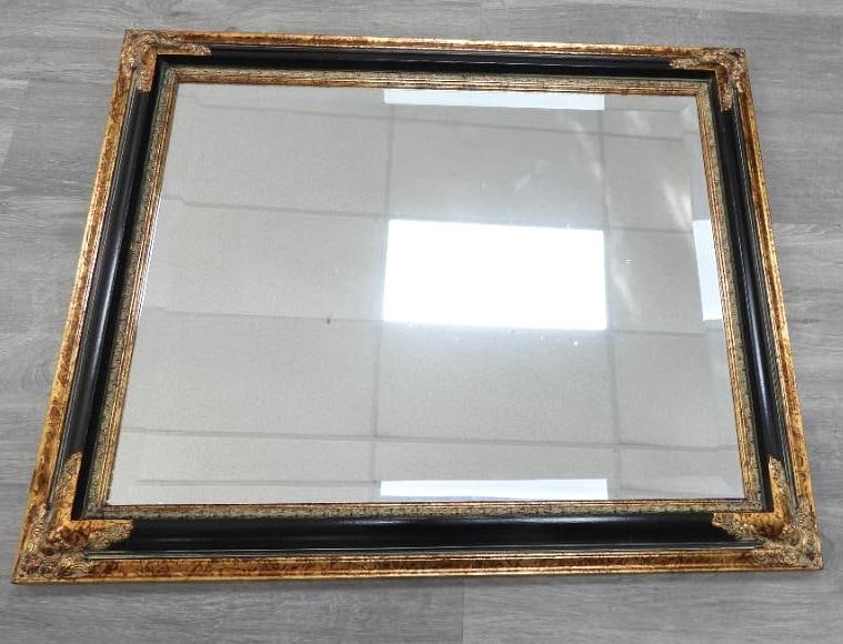 Decorative rectangular wall mirror with black and gold-toned frame: Decorative rectangular wall mirror with black and gold-toned frame, 27.75" x 34.5" frame
