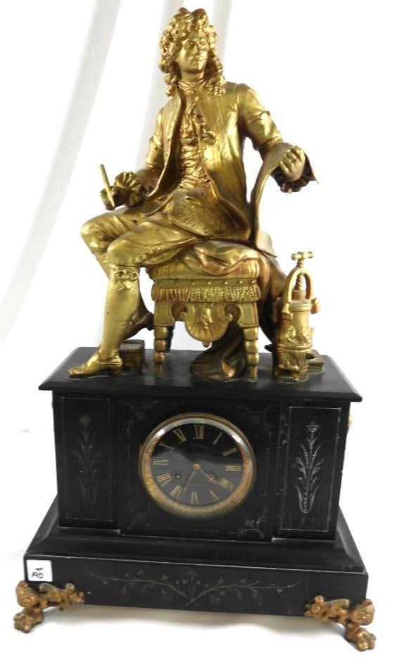 Antique Marble Demoulinneuf mantel clock featuring a figural finial of a seated man: Demoulinneuf mantel clock featuring a figural finial of a seated man, Gold guilding, 24.5"T, 15"L, 7.25"W, heavy in weight