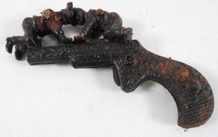Vintage Cast-Iron top cap gun, possibly from late 19th century or early 20th century