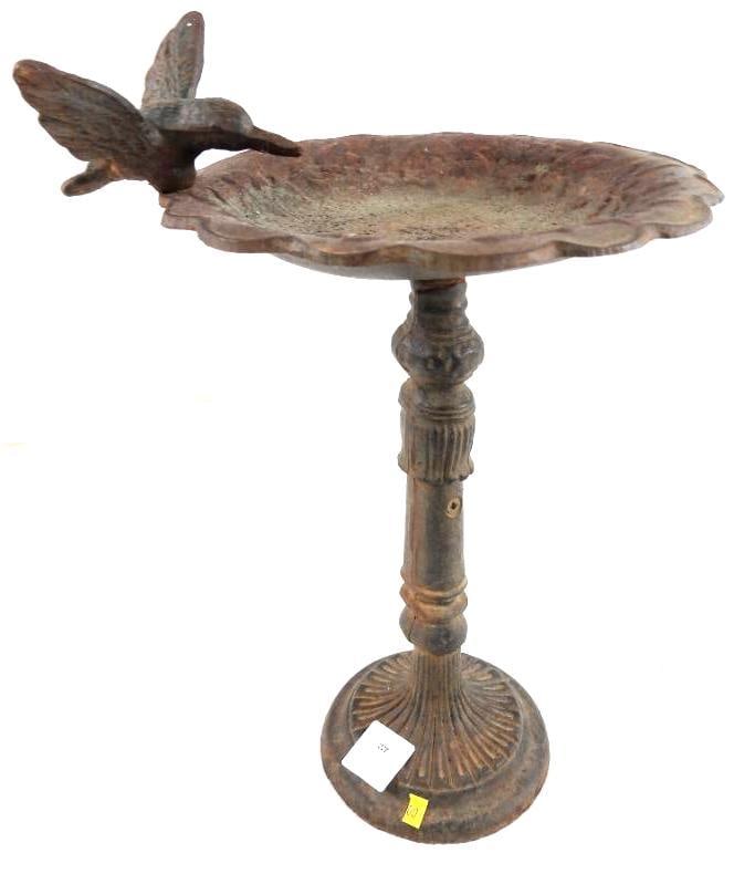 Cast-iron pedestal bird bath: Cast-iron pedestal bird bath, 11"T, 8.5"W at widest and 4.5"W base